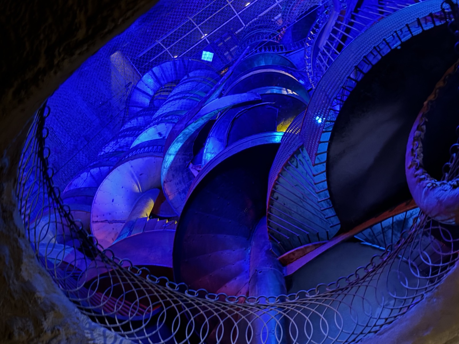 The towering interior slide structure at City Museum, spiraling down through multiple floors