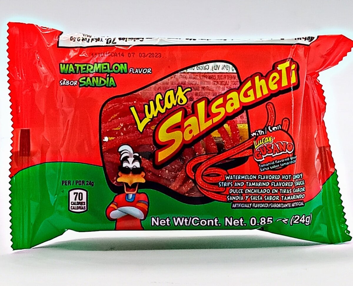 A real photo of a single Lucas Skwinkles Salsagheti watermelon pouch, showing the Lucas mascot, the yellow wordmark, and the label reading 'watermelon flavored hot candy strips and tamarind flavored sauce'