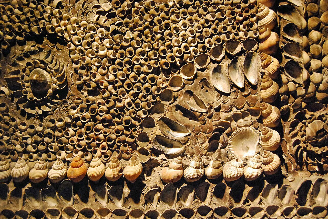 Close-up of the Shell Grotto mosaic showing winkles, cockles, mussels and scallops arranged in patterns