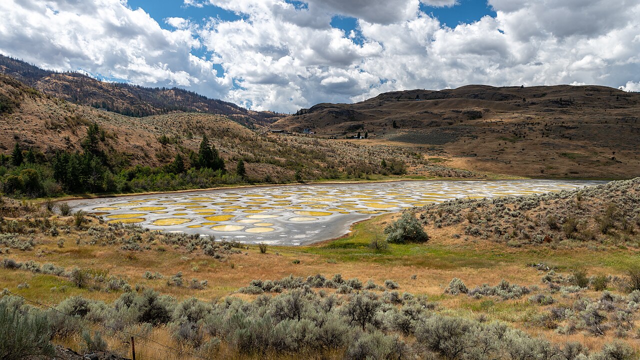 A wide view of Spotted Lake set in the dry sagebrush hills of the Similkameen Valley