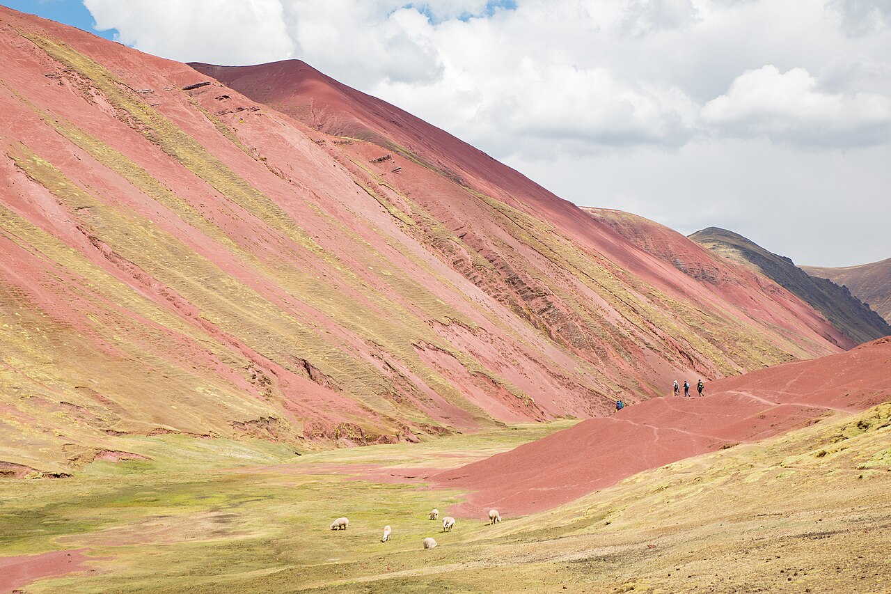 The deep red rolling hills of the Red Valley near Vinicunca